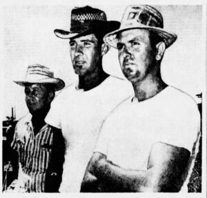 Three men in hats and white t-shirts.