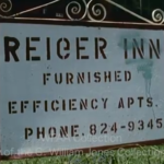 white sign that says reiger inn