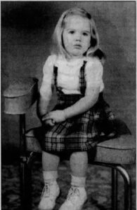 five year old girl sitting in chair