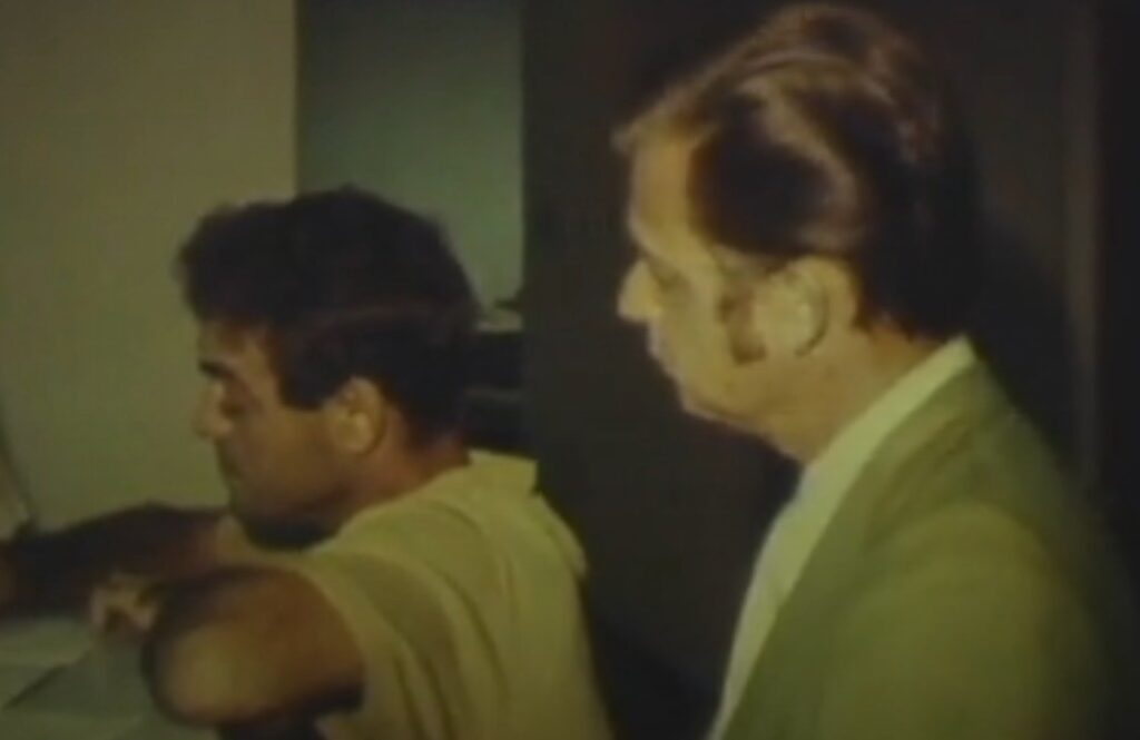 two men facing left