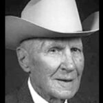 elderly man in cowboy hat