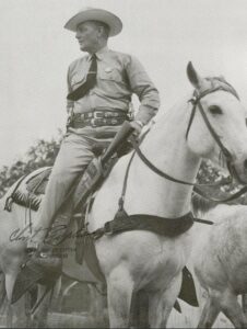Man in western hat on a horse