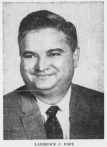 headshot of man in suit