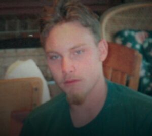 man in green shirt