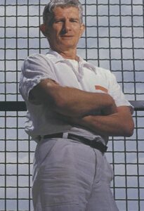 man standing wearing white