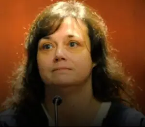 Head Shot of female with bangs and shoulder length hair