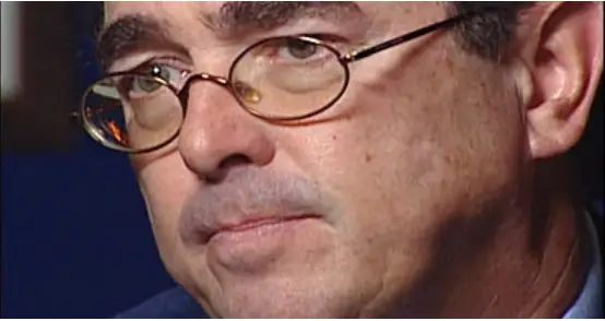 man's face with glasses