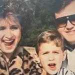 woman boy man in family portrait