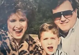 woman boy man in family portrait